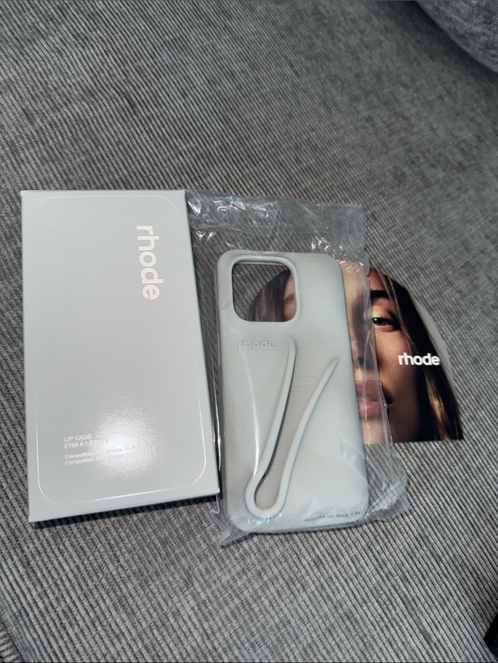 RHODE Light Gray Phone Case with Integrated Strap IPHONE 15 Pro w/ Stickers